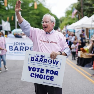 Georgia Supreme Court candidate John Barrow waves while participating in the Inman Park Parade on Saturday, April 27, 2024, in Atlanta. (Elijah Nouvelage for the AJC)