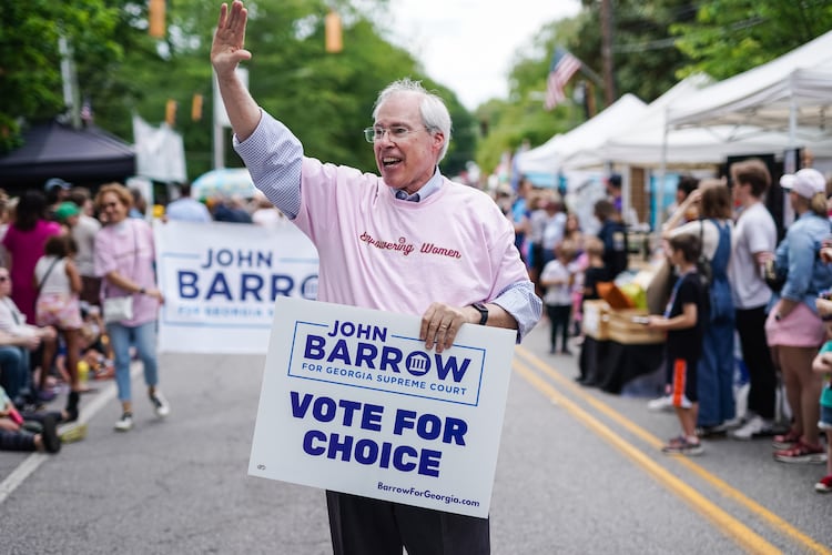 Georgia Supreme Court candidate John Barrow waves while participating in the Inman Park Parade on Saturday, April 27, 2024, in Atlanta. (Elijah Nouvelage for the AJC)