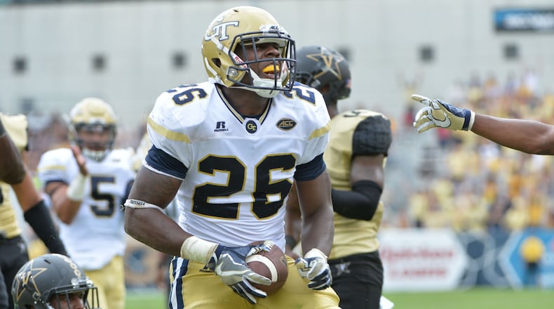 Georgia Tech Yellow Jackets running back Dedrick Mills (26) celebrates after he scored a touchdown in the second half at Bobby Dodd Stadium on Saturday, September 17, 2016. (Hyosub Shin/hshin@ajc.com)