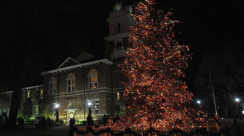 The huge decorated Christmas Tree lit up the court yard at the Historic Courthouse in Lawrenceville, Georgia Saturday, Dec. 11, 2010. FILE PHOTO