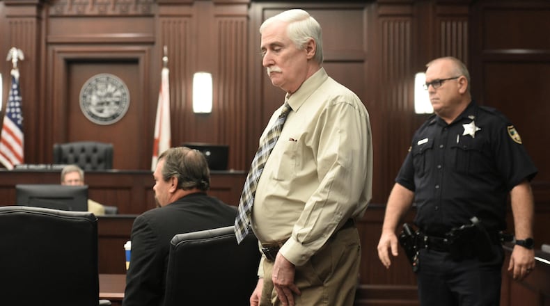 Defendant Donald Smith enters the courtroom for the start of the second day of his trial for the rape and murder of 8-year-old Cherish Perrywinkle, Tuesday, Feb.  13, 2018 in Jacksonville, Fla. He is accused of abducting, raping and killing the girl after he lured her away from her mother in June of 2013. (Bob Self/The Florida Times-Union via AP)