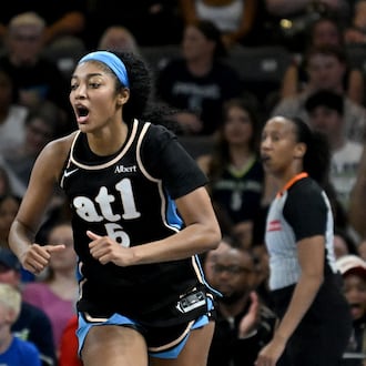 Dream forward Angel Reese reacts after scoring against the Wings on Friday, May 22, 2026, at Gateway Center Arena in Atlanta. Reese had 15 points and nine rebounds. (Hyosub Shin/AJC)