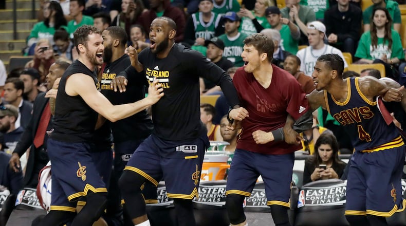 Cleveland Cavaliers (from left) Kevin Love, LeBron James, Kyle Korver and Iman Shumpert celebrate a basket during the second half of Game 5 of the NBA basketball Eastern Conference finals against the Boston Celtics, on May 25, 2017, in Boston. (AP Photo/Elise Amendola)