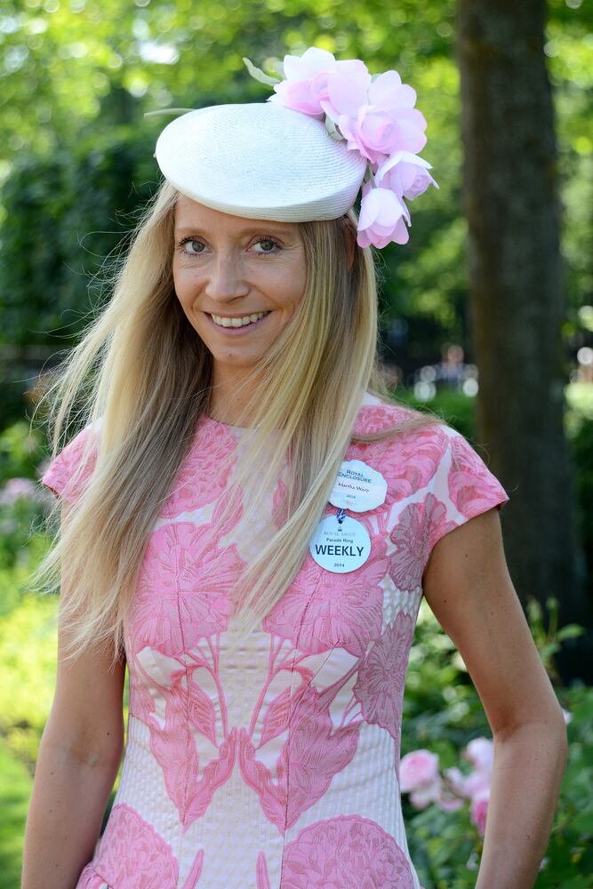 Race goers show hat styles