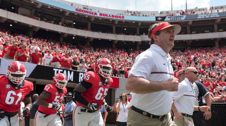 April 22, 2017, Athens - University of Georgia head coach Kirby Smart takes the field with the red team during the G-Day game in Athens, Georgia, on Saturday, April 22, 2017. (DAVID BARNES / DAVID.BARNES@AJC.COM)