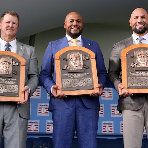 The 2026 Baseball Hall of Fame inductees Jeff Kent, left, Andruw Jones, center, and Carlos Beltran pose for pictures after the induction ceremony in Cooperstown, N.Y., Sunday, July 26, 2026. (AP Photo/Seth Wenig)