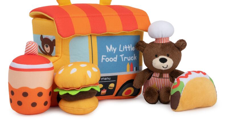 A five-piece food truck playset features sensory-stimulating toys and a convenient carry handle.
(Courtesy of GUND)