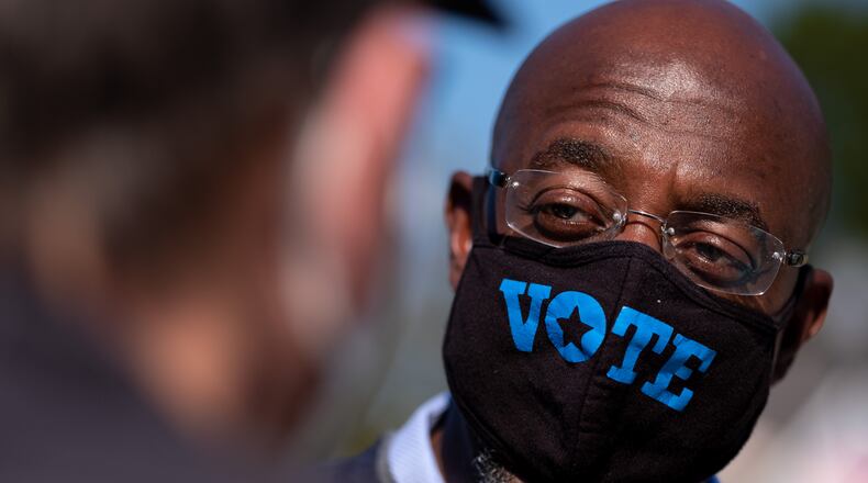 100310-Powder Springs-Rev. Raphael Warnock, who is running for Senate, talks to supporters during a Democratic gathering in Powder Springs on Saturday October 3, 2020. Ben Gray for the Atlanta Journal-Constitution