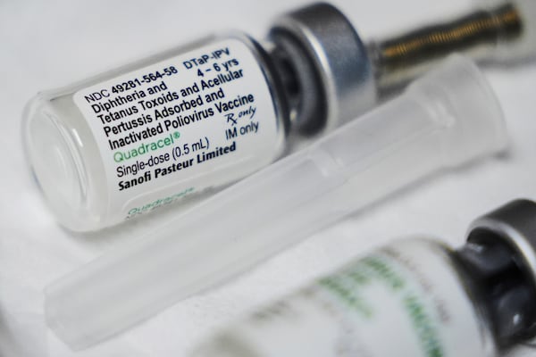 A childhood vaccination that includes a polio dose is prepared at the Dallas County Health and Human Services immunization clinic in Dallas, Friday, April 4, 2025. (AP Photo/LM Otero)