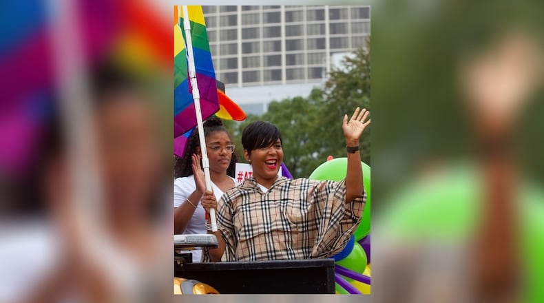 Mayor of Atlanta Keisha Lance Bottoms waves to the crowd as she makes her way down Peachtree Street during the 49th Annual Pride Festival and Parade in Atlanta Sunday, Oct 13, 2019.  STEVE SCHAEFER / SPECIAL TO THE AJC