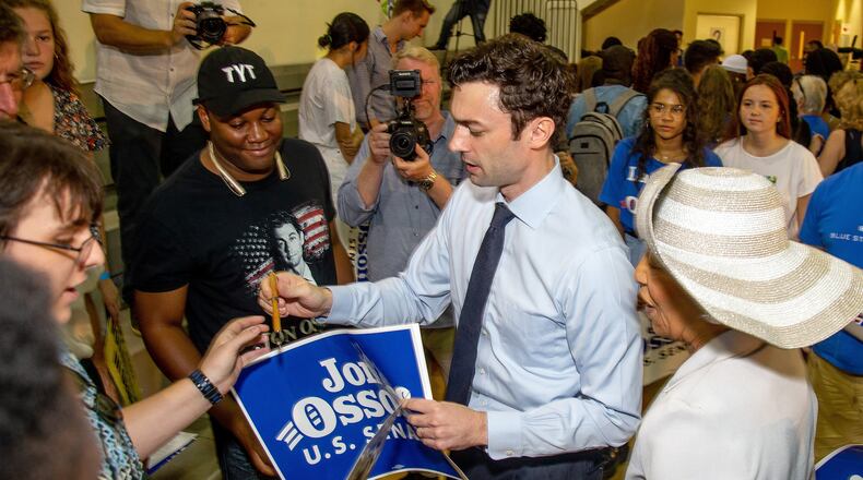 Jon Ossoff, a Democratic candidate for one of Georgia's U.S. Senate seats, signs autographs during a voter registration rally at the MLK Receation Center Saturday, September 28, 2019. (Photo: STEVE SCHAEFER / SPECIAL TO THE AJC)