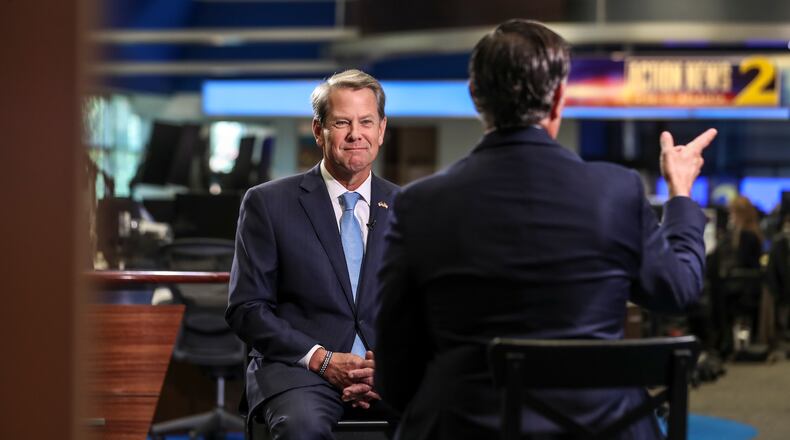 Governor Brian Kemp (left) sits with Anchor Justin Farmer (right) for a one-on-one interview on Channel 2 Action News in Atlanta on Wednesday, Nov. 9, 2022. (John Spink / John.Spink@ajc.com)