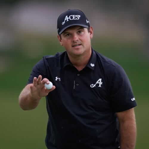 Patrick Reed of the United States reacts after winning the Dubai Desert Classic in United Arab Emirates, Sunday, Jan. 25, 2026. (AP Photo/Altaf Qadri)