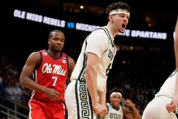 Michigan State forward Frankie Fidler (8) reacts to play against Mississippi during the second half in the Sweet 16 of the NCAA college basketball tournament, Friday, March 28, 2025, in Atlanta. (AP Photo/George Walker IV)