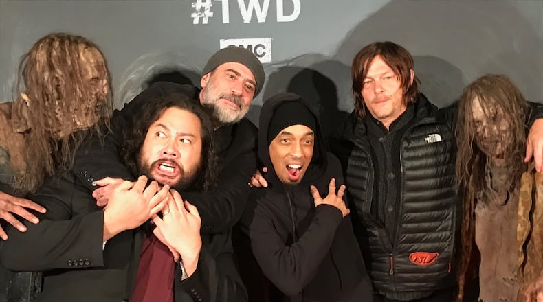 Cooper Andrews (Jerry), Jeffrey Dean Morgan (Negan), Dallas Austin (host), Norman Reedus (Daryl) and two walkers. CREDIT: Rodney Ho/rho@ajc.com
