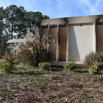 Boards cover the charred remains of the Beth Israel Congregation library, which was set on fire Jan. 10, 2026, in Jackson, Mississippi. A 19-year-old man who espoused antisemitic views was arrested. (Sophie Bates/AP)