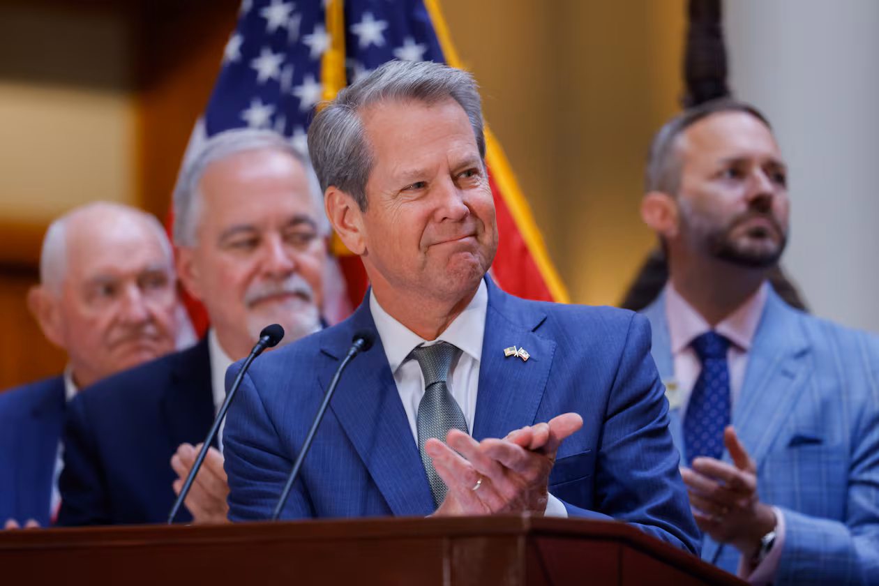 Georgia Gov. Brian Kemp — pictured before he signed a series of education bills at the Georgia Capitol on Tuesday, May 5, 2026 — notified the General Assembly that he intends to sign bills to cut the state income tax rate and to limit annual property tax assessment increases. (Arvin Temkar/AJC)