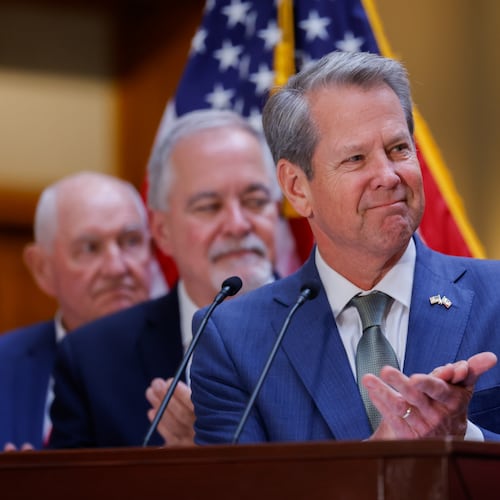 Georgia Gov. Brian Kemp — pictured before he signed a series of education bills at the Georgia Capitol on Tuesday, May 5, 2026 — notified the General Assembly that he intends to sign bills to cut the state income tax rate and to limit annual property tax assessment increases. (Arvin Temkar/AJC)