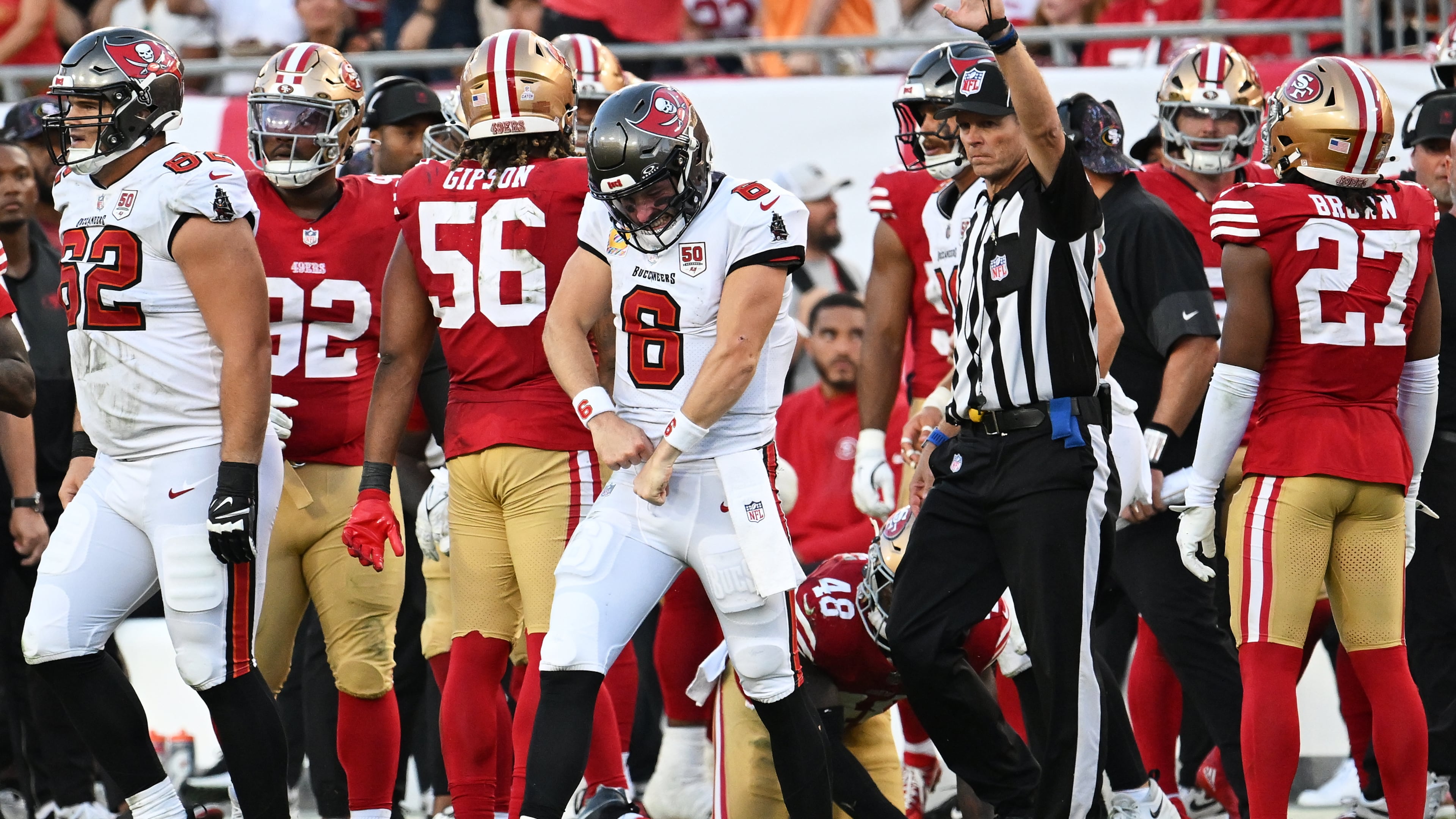 Tampa Bay Buccaneers quarterback Baker Mayfield (6) reacts after running for a first down during the second half of an NFL football game against the San Francisco 49ers in Tampa, Fla., Sunday, Oct. 12, 2025. (AP Photo/Jason Behnken)