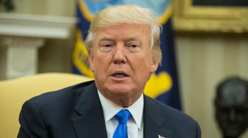 WASHINGTON, DC - JUNE 09: US President Donald Trump delivers brief remarks to members of the news media while meeting with President of Romania Klaus Iohannis (not pictured) in the Oval Office of the White House, on June 9, 2017 in Washington, DC.  (Photo by Michael Reynolds-Pool/Getty Images)