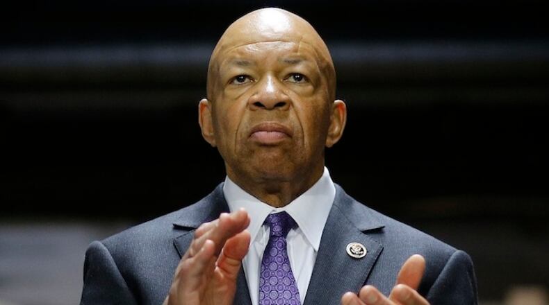 Rep. Elijah Cummings, D-Md., claps during a campaign event featuring Democratic presidential candidate Hillary Clinton at City Garage in Baltimore, Sunday, April 10, 2016. (AP Photo/Patrick Semansky)