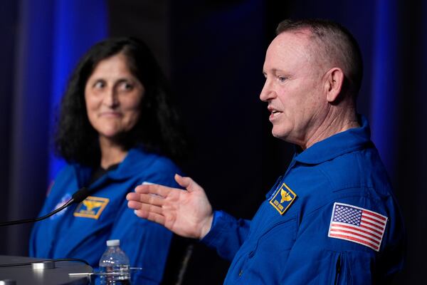 Astronauts Suni Williams and Butch Wilmore talk to reporters during a press conference at Johnson Space Center on Monday, March 31, 2025, in Houston. (AP Photo/Ashley Landis)