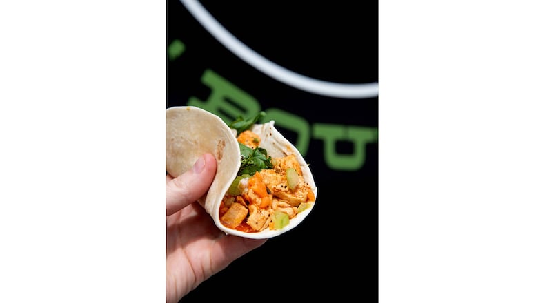 Let's Taco Bout It, a food truck that's set to open in Chamblee Tap & Market, serves a variety of traditional and fusion tacos, nachos and bowls. / Courtesy of Let's Taco Bout It