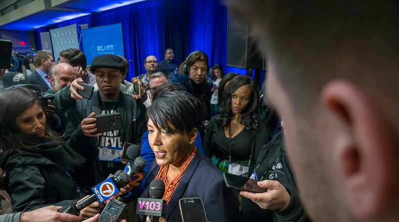 01/28/2019 -- Atlanta, Georgia -- Atlanta Mayor Keisha Lance Bottoms (center) answers questions during a media scrum following a 'Welcome to Super Bowl LIII' press conference at the Georgia World Congress Center in Atlanta, Monday, January 28, 2019. (ALYSSA POINTER/ALYSSA.POINTER@AJC.COM)