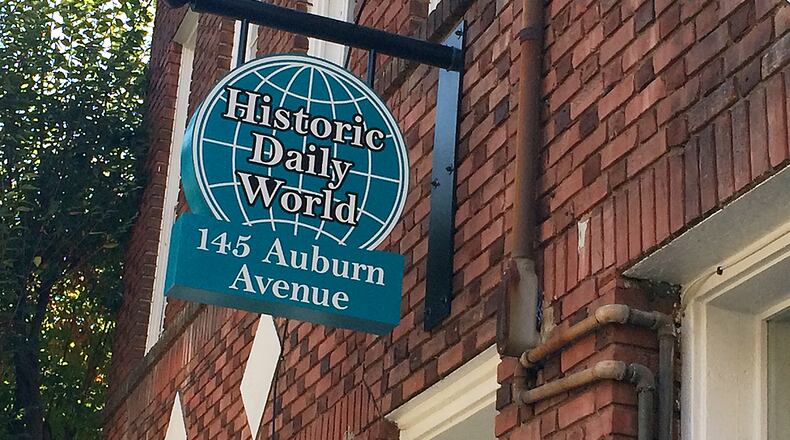 In 2015, the Daily World building on Auburn Avenue reopened as a retail and apartment space. The refurbished building includes a sign (not neon) over the door that's in tribute to the original, and a painted window sign that recreates the newspaper's logo.