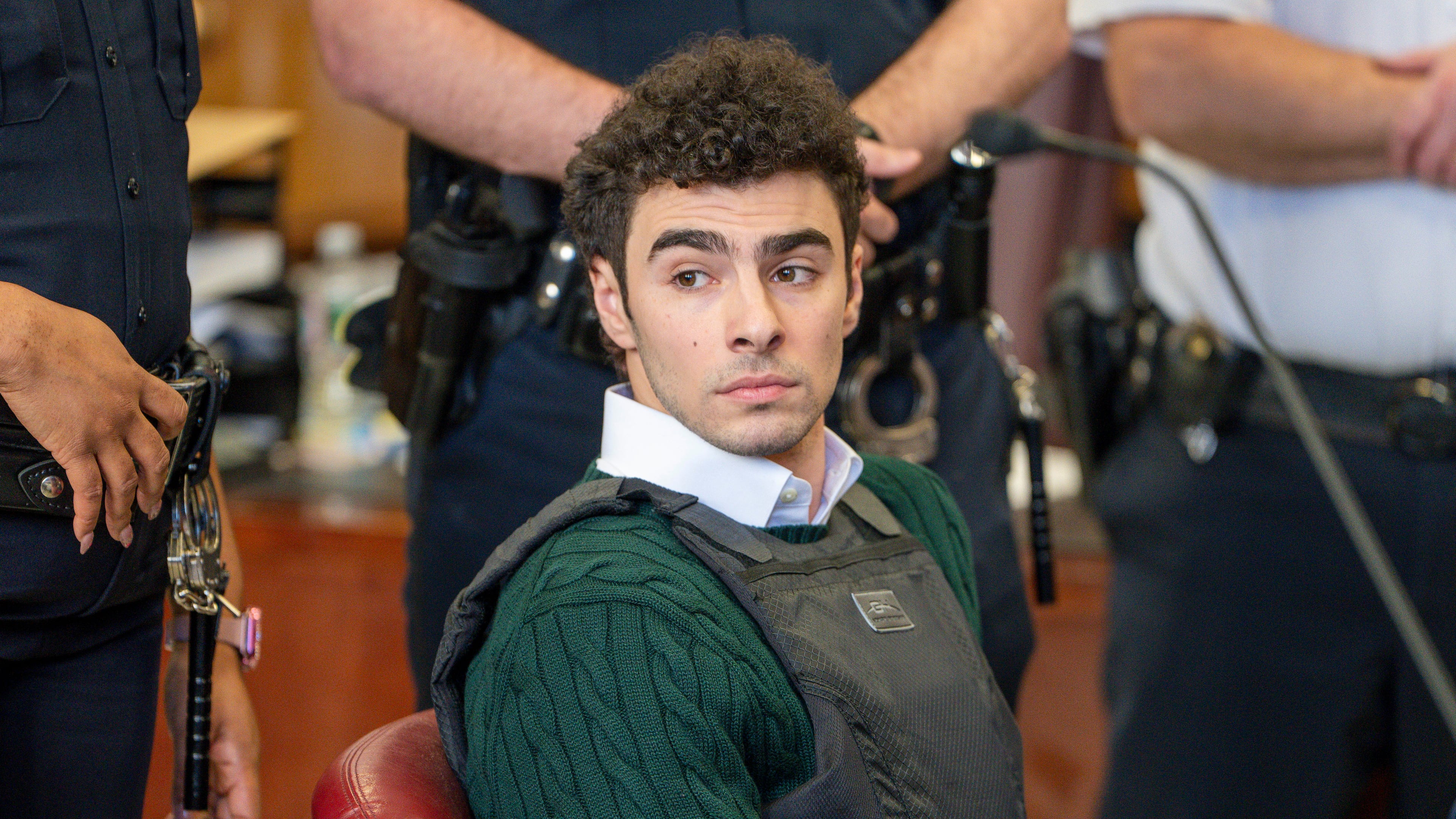 FILE - Luigi Mangione, accused of fatally shooting the UnitedHealthcare CEO Brian Thompson in New York City and leading authorities on a five-day search, appears in court for a hearing, Feb. 21, 2025, in New York. (Steven Hirsch/New York Post via AP, Pool, File)
