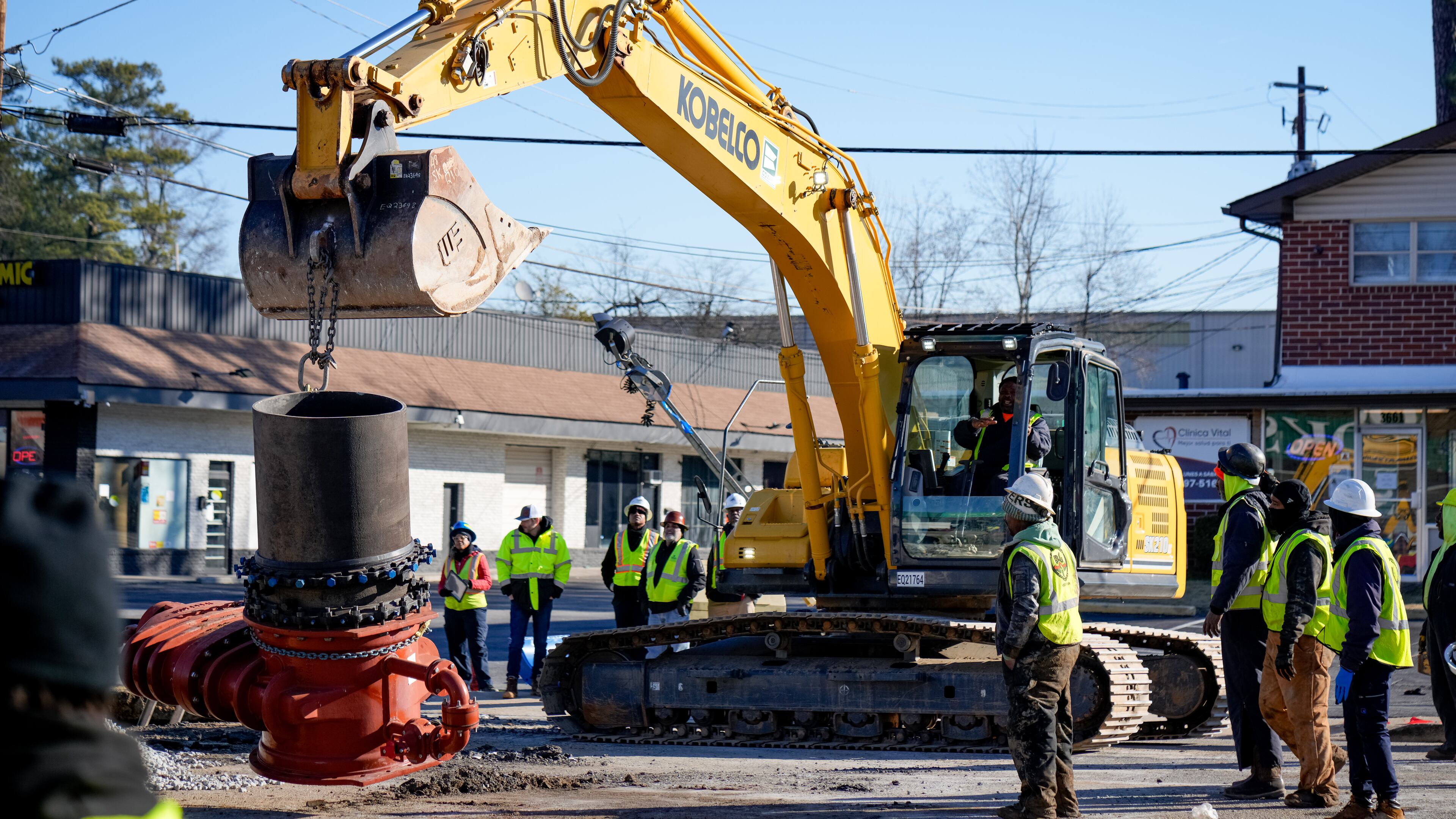 DeKalb County watershed crews work to repair a broken water main on Clairmont Road on Thursday, Jan. 16, 2025. (Ben Hendren for The Atlanta Journal-Constitution)