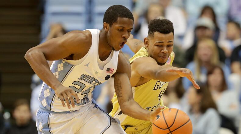 CHAPEL HILL, NC - JANUARY 20: Kenny Williams #24 of the North Carolina Tar Heels goes after a loose ball against Brandon Alston #4 of the Georgia Tech Yellow Jackets during their game at Dean Smith Center on January 20, 2018 in Chapel Hill, North Carolina. (Photo by Streeter Lecka/Getty Images)