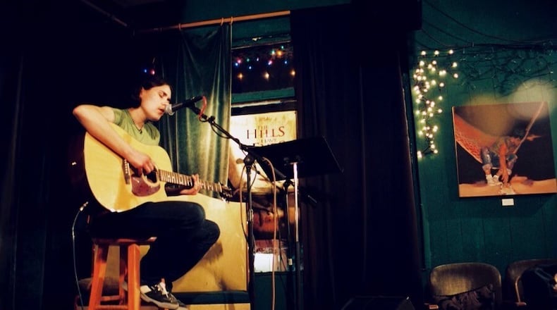 Katie Janness loved writing songs and playing guitar, her friends said. The 40-year-old Atlanta woman was killed in Piedmont Park last year while walking her dog. (Handout)