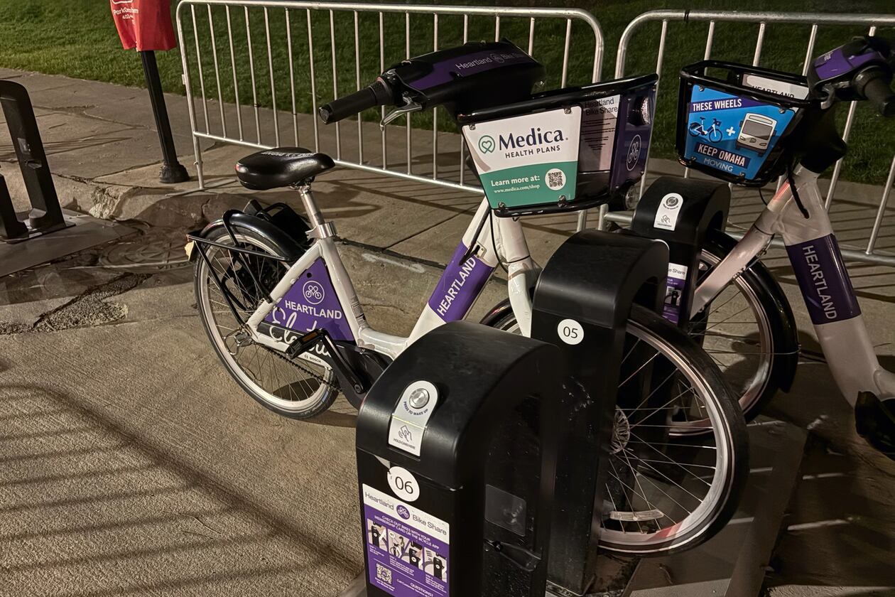 Omaha's Heartland Bike Share program places 400 e-bikes, such as this one, across the metropolitan area for public use. It is free for residents of metropolitan Omaha and a small charge for out-of-town sports columnists. (Ken Sugiura/AJC)