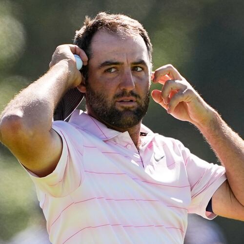 Scottie Scheffler waits to play on the eighth hole during the final round of the U.S. Open golf tournament at Shinnecock Hills Golf Club in Southampton, N.Y., Sunday, June 21, 2026. (AP Photo/Gerald Herbert)