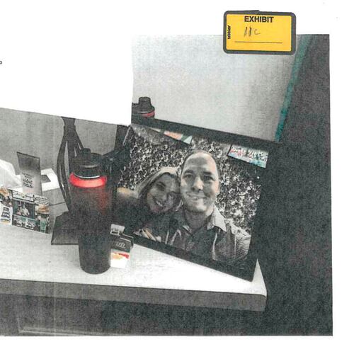 FILE - This image provided by the Fairfax County Police Department and taken on Oct. 13, 2023, was submitted as evidence in the murder case against Brendan Banfield shows a framed photo of Banfield and Juliana Peres Magalhães on his bedside table in Herndon, Va. (Fairfax County Police Department via AP, File)