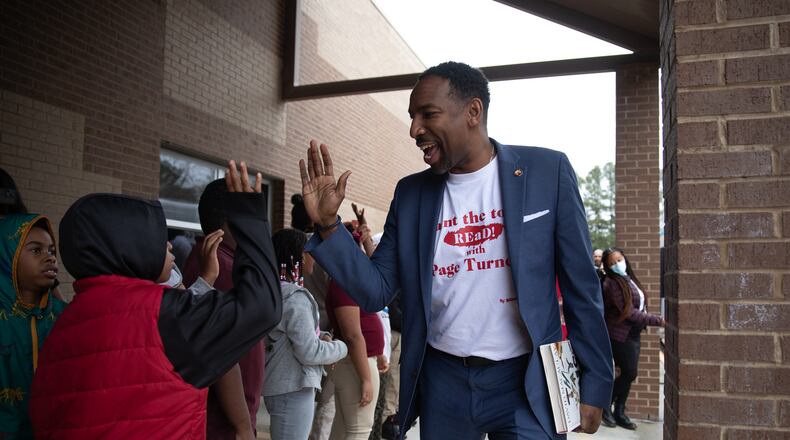 Atlanta Mayor Andre Dickens is greeted by students at Heritage Academy elementary school in Atlanta on Feb. 2, 2023 (Riley Bunch/riley.bunch@ajc.com)