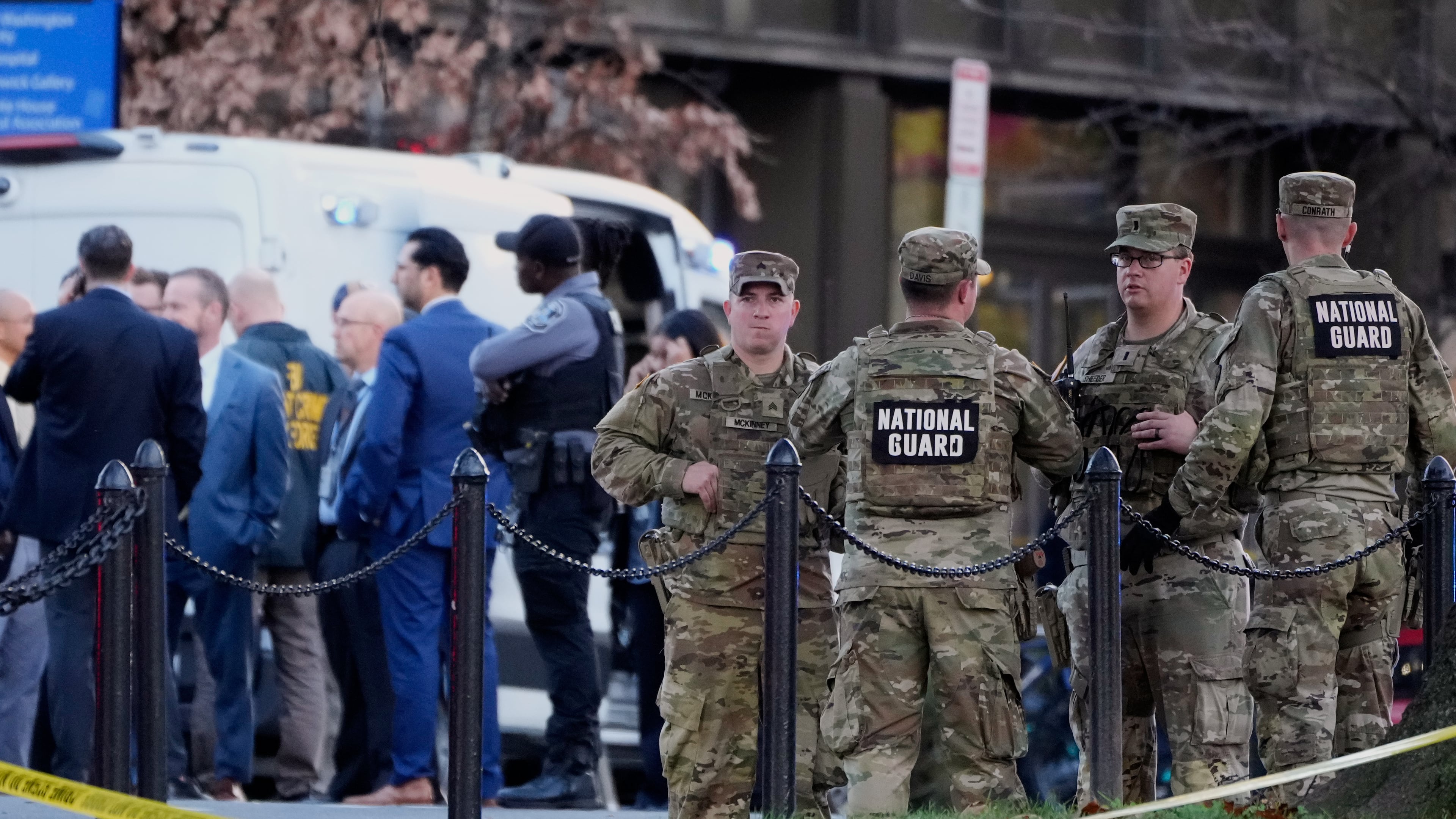 Emergency personnel gather in a cordoned off area where National Guard soldiers were shot near the White House Wednesday, Nov. 26, 2025, in Washington. (AP Photo/Mark Schiefelbein)