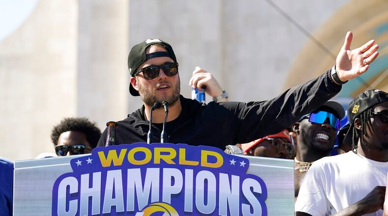 Los Angeles Rams quarterback Matthew Stafford speaks during the team's victory celebration and parade in Los Angeles, Wednesday, Feb. 16, 2022, following the Rams' win Sunday over the Cincinnati Bengals in the NFL Super Bowl 56 football game. (AP Photo/Marcio Jose Sanchez)