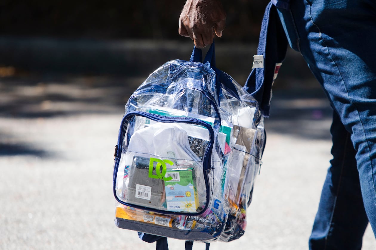 Dale William clutches his free backpack as he leaves the DeKalb Covid-19 vaccination event on Saturday, September 24, 2022, at The Mall at Stonecrest in Stonecrest, Georgia. The event offered $100 gift cards, clear bookbags for kids and a lineup of performers for entertainment while people waited for their shots. (CHRISTINA MATACOTTA FOR THE ATLANTA JOURNAL-CONSTITUTION)