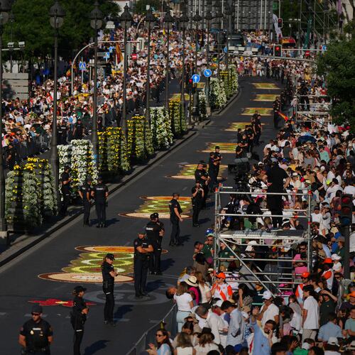 People wait for the arrival of Pope Leo XIV ahead of a Holy Mass and Corpus Christi procession at Plaza de Cibeles in Madrid, Spain, Sunday, June 7, 2026, on the second day of his seven-day apostolic visit to mainland Spain and the Canary Islands. (AP Photo/Manu Fernandez)