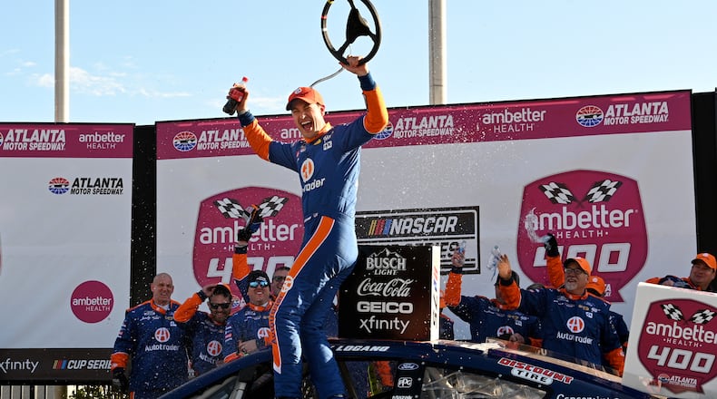 Joey Logano celebrates in Victory Lane after winning the Ambetter Health 400 NASCAR Cup Series Race at Atlanta Motor Speedway, March 19, 2023, in Hampton. (Hyosub Shin / Hyosub.Shin@ajc.com)