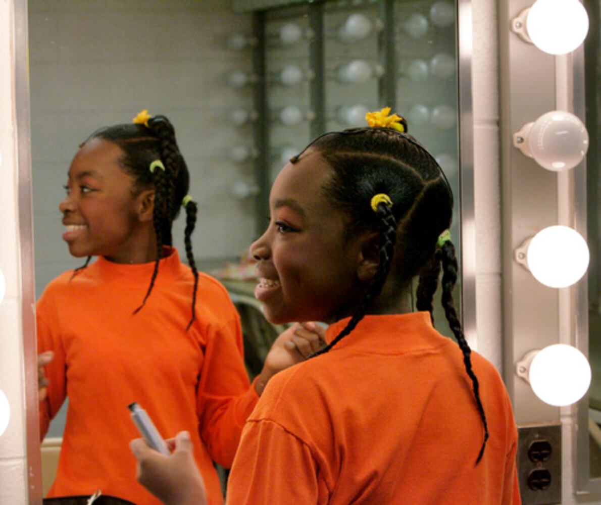 Appling girl immersed in Dr. Seuss' world