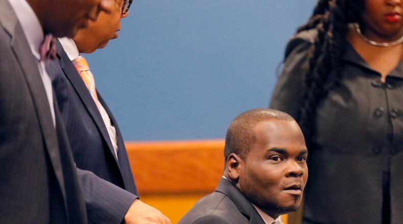 Basil Eleby takes his seat at the defense table before his case is called in this June 2017 file photo.