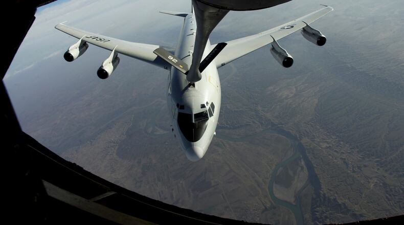 A U.S. Air Force photo of an E-8C Joint Surveillance Target Attack Radar System (Joint STARS) receiving fuel from a KC-135 tanker plane in 2004. (U.S. Air Force via The New York Times)