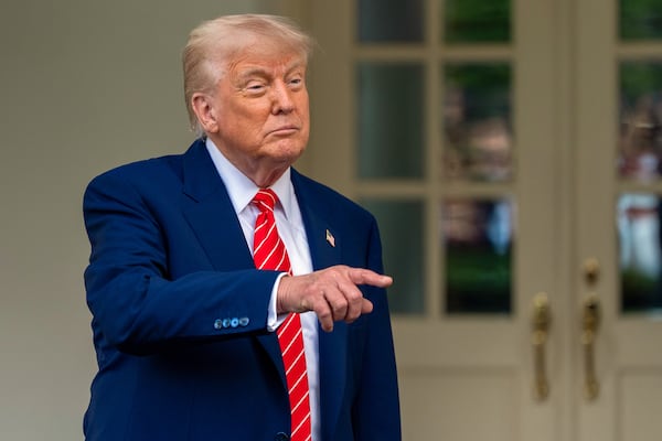 President Donald Trump speaks with reporters in front of the West Wing of the White House, Thursday, May 8, 2025, in Washington. (AP Photo/Alex Brandon)