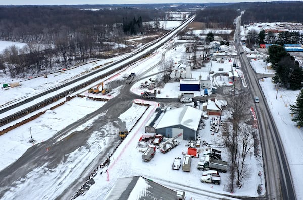 An aerial photo shows where crews are backfilling stone and gravel on the site of the Feb. 3, 2023, Norfolk Southern freight train derailment, Monday, Jan. 22, 2024, in East Palestine. (Matt Freed for the Atlanta Journal Constitution)