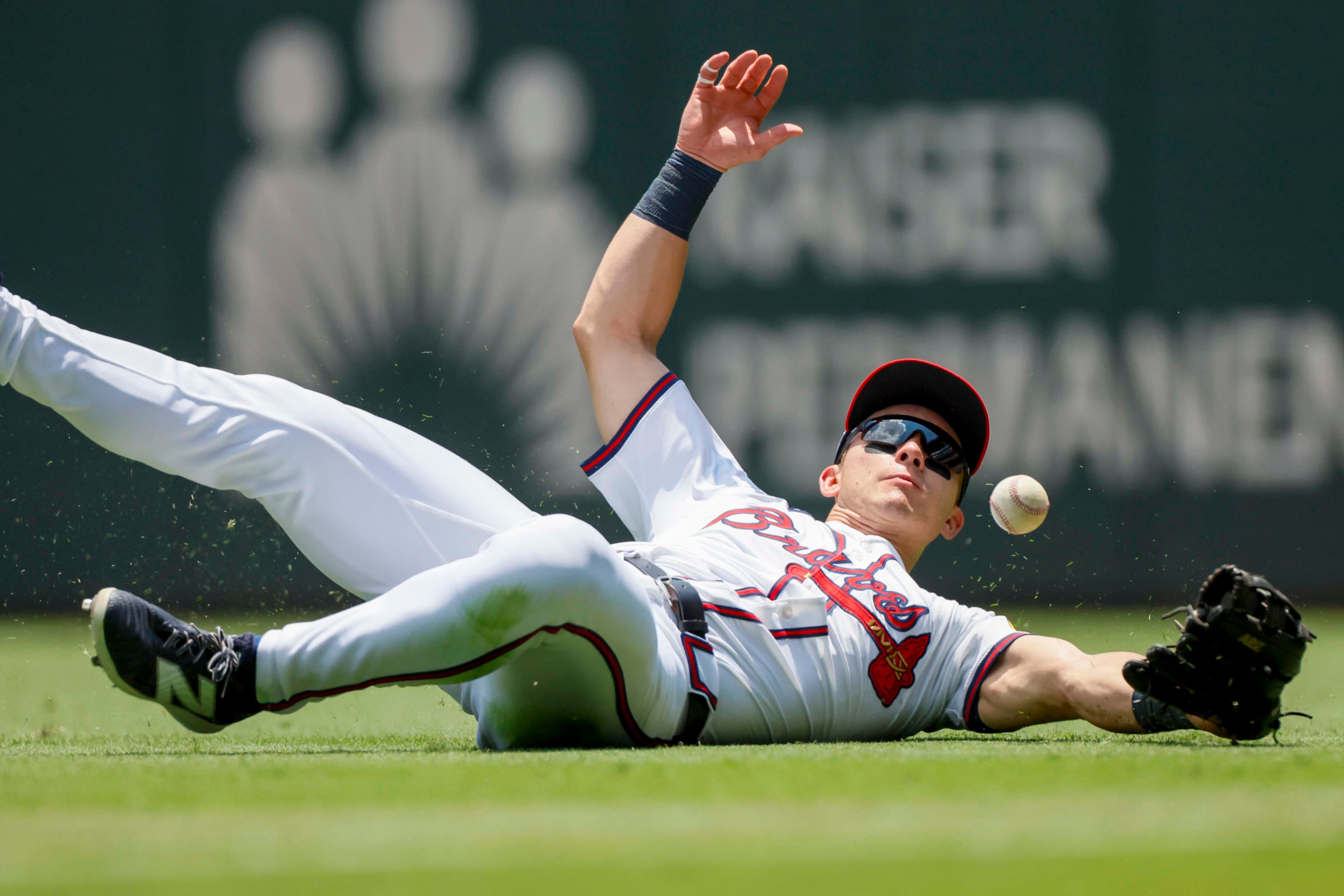 Atlanta Braves outfielder Stuart Fairchild (17) dives for the ball but was unable to catch it during the sixth inning against the Baltimore Orioles at Truist Park on Sunday, July 6, 2025, in Atlanta.
(Miguel Martinez/ AJC)