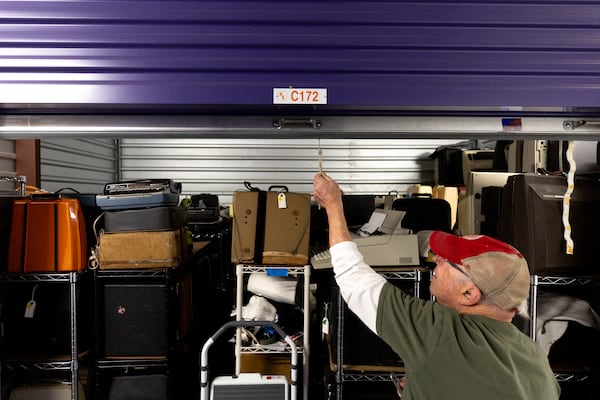 Tom Rehkopf has six storage units filled with his collection of typewriters. (Arvin Temkar/AJC)