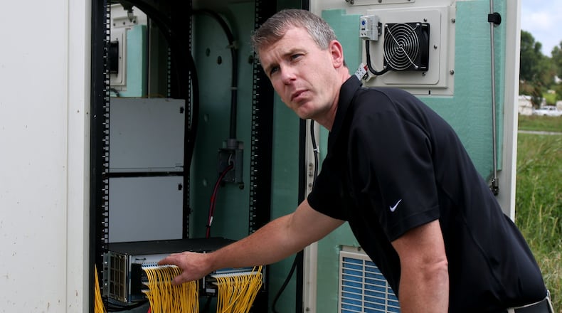 Daniel Frizzell, the director of engineering at Blue Ridge Mountain EMC, explains the way in which the utility provides internet services to rural areas. Seven of the state's electric cooperates will receive a combined $130 million in federal COVID-19 relief to help expand broadband to rural Georgia. Jenna Eason / Jenna.Eason@coxinc.com